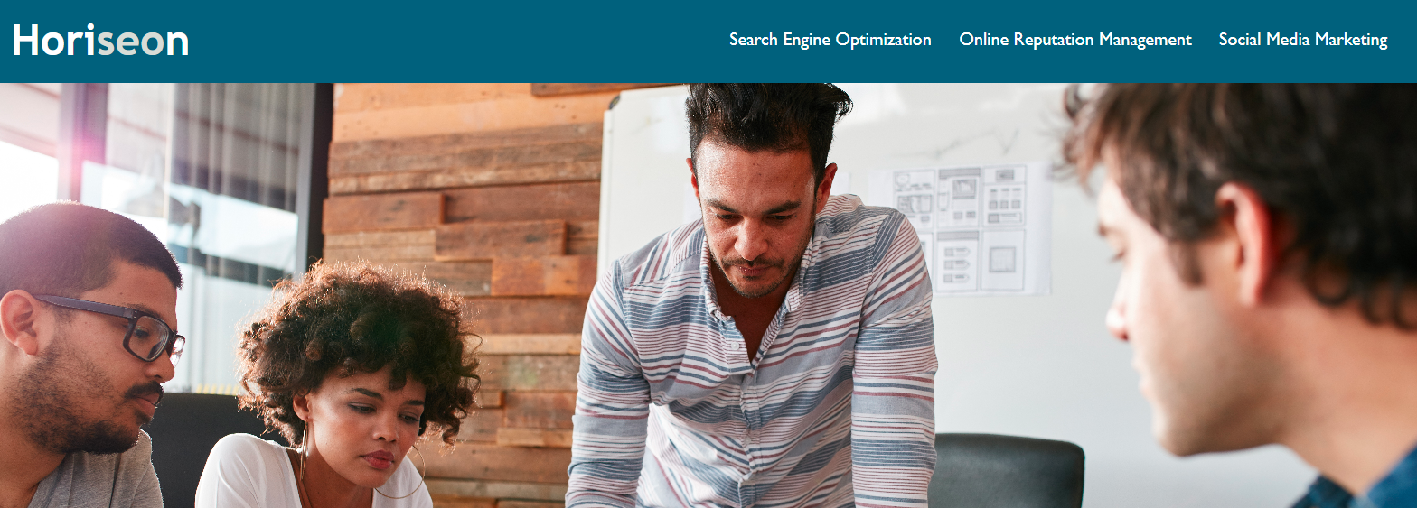 image of team collaborating on work to represent a code refactoring project